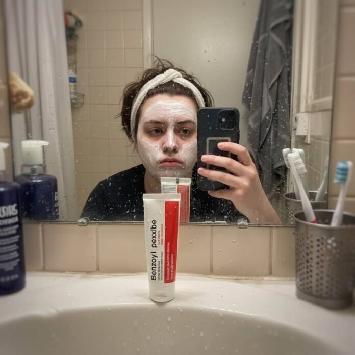 "Exhausted face, acne treatment, Brooklyn bathroom selfie."